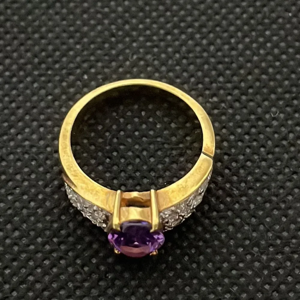 Large ring with a large purple gem